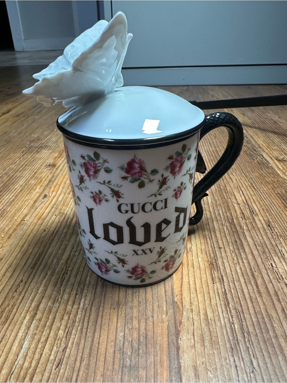 Gucci "Rose" white floral porcelain mug with black handle